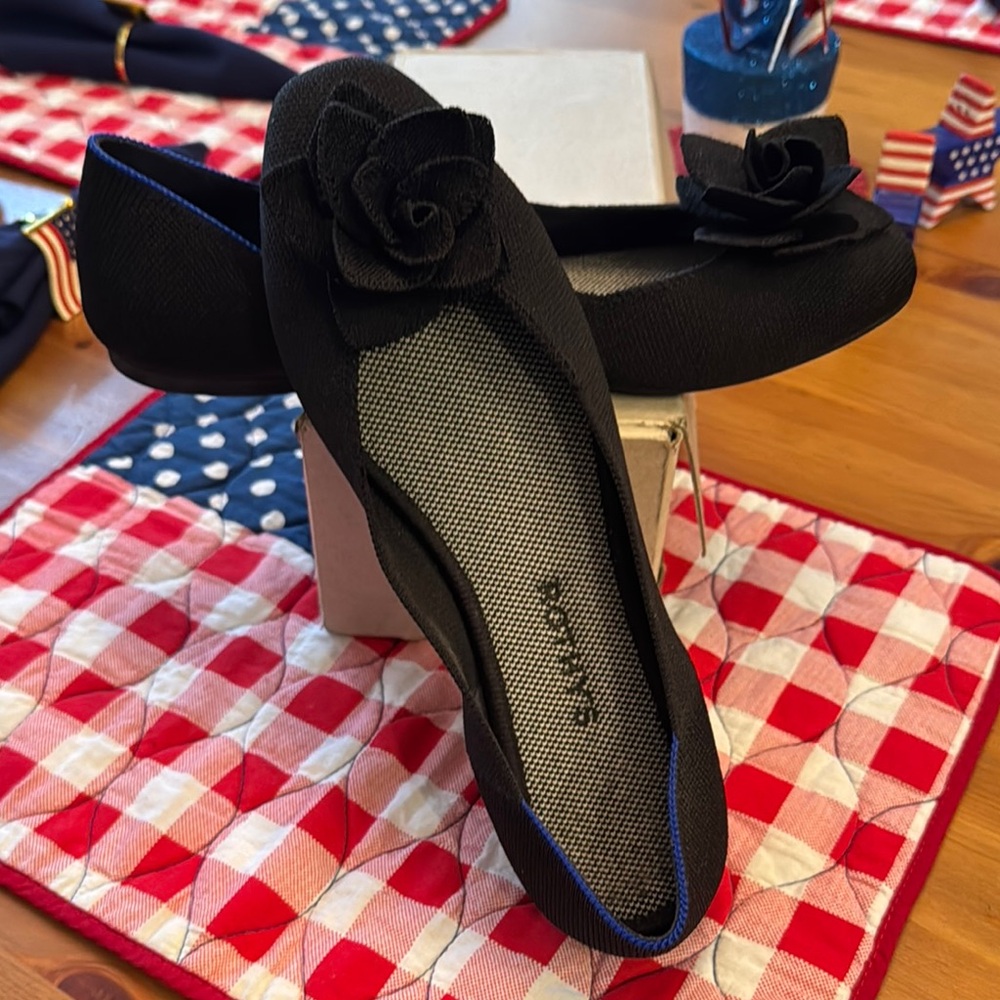 Rothy's Black Flats with Floral Accent